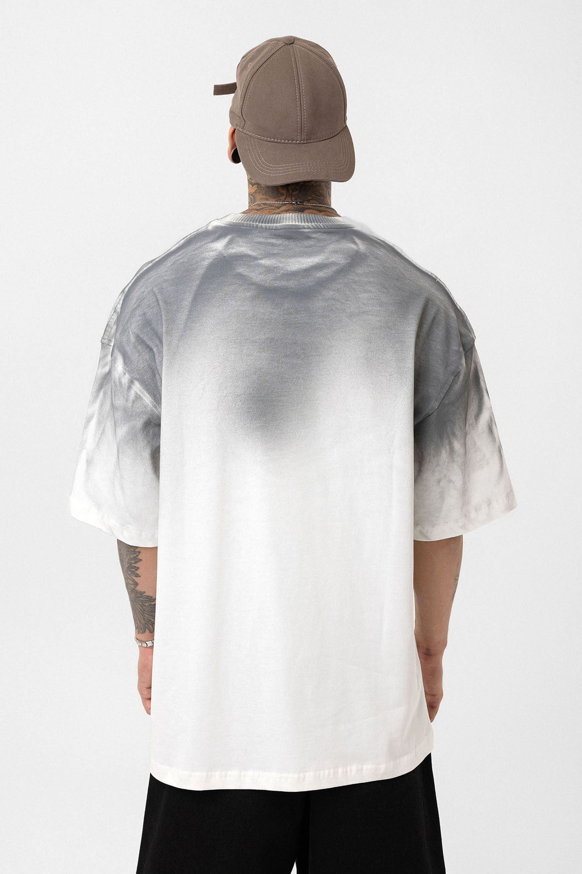 Oversized T-Shirt with Washed-Out Print and Detailed Design