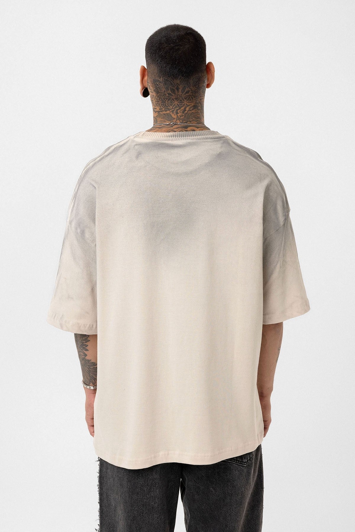 Oversized T-Shirt with Washed-Out Print and Detailed Design