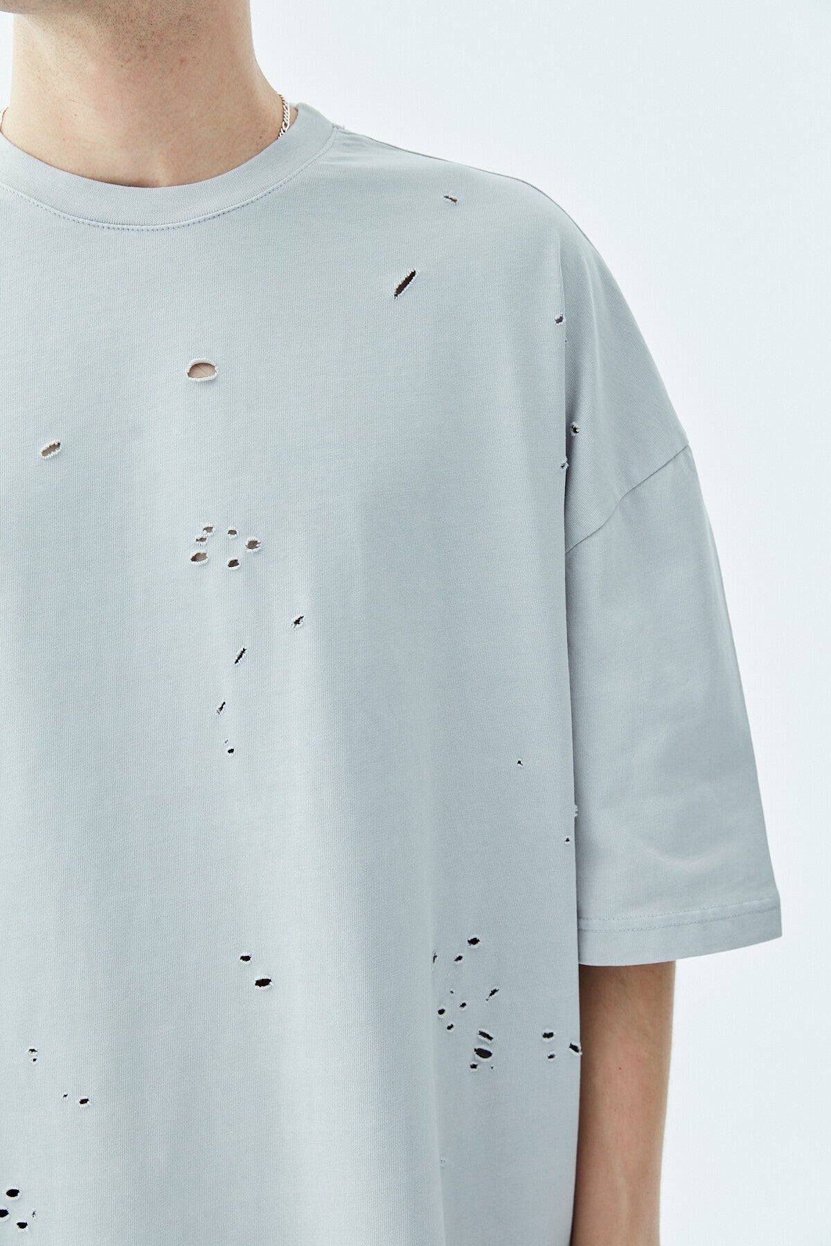 Oversized T-Shirt with Ripped Details