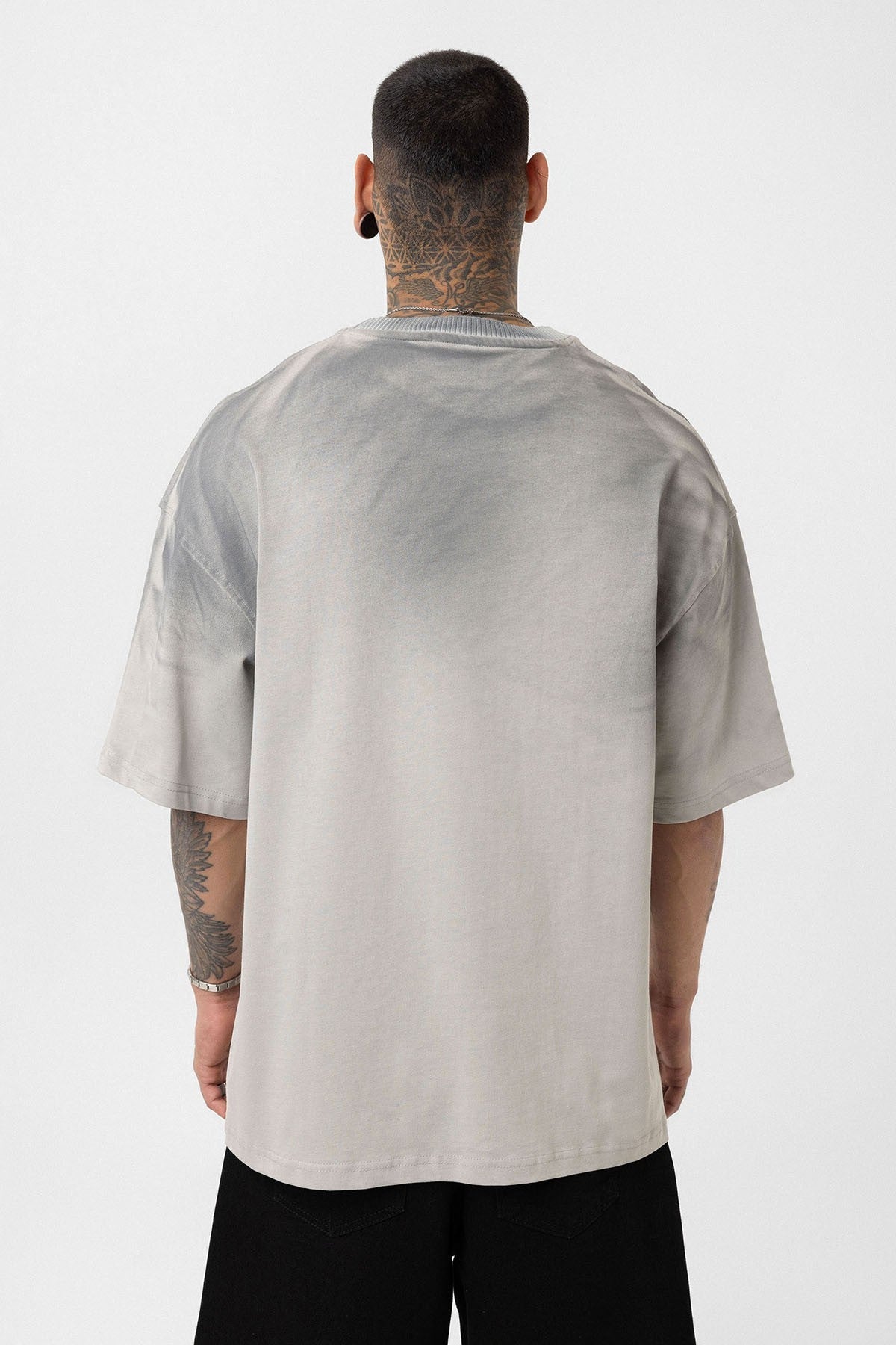 Oversized T-Shirt with Washed-Out Print and Detailed Design