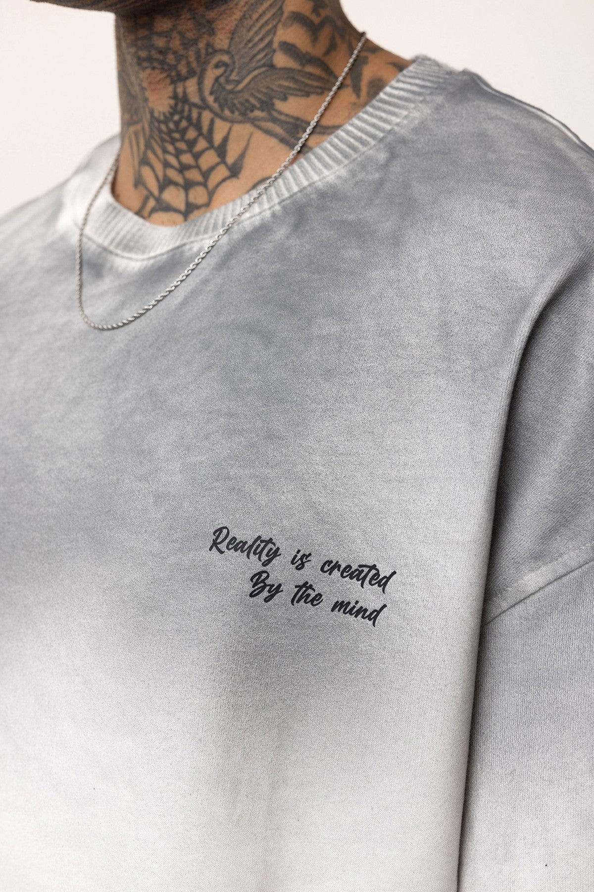 Oversized T-Shirt with Washed-Out Print and Detailed Design