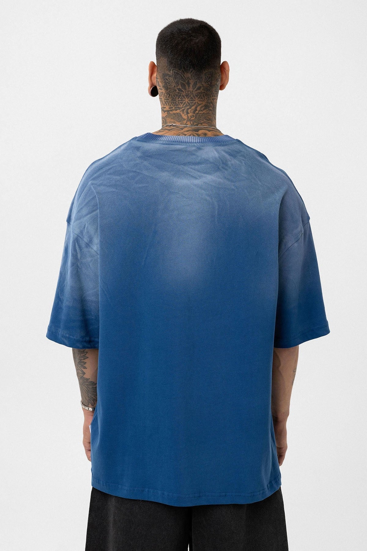 Oversized T-Shirt with Washed-Out Print and Detailed Design