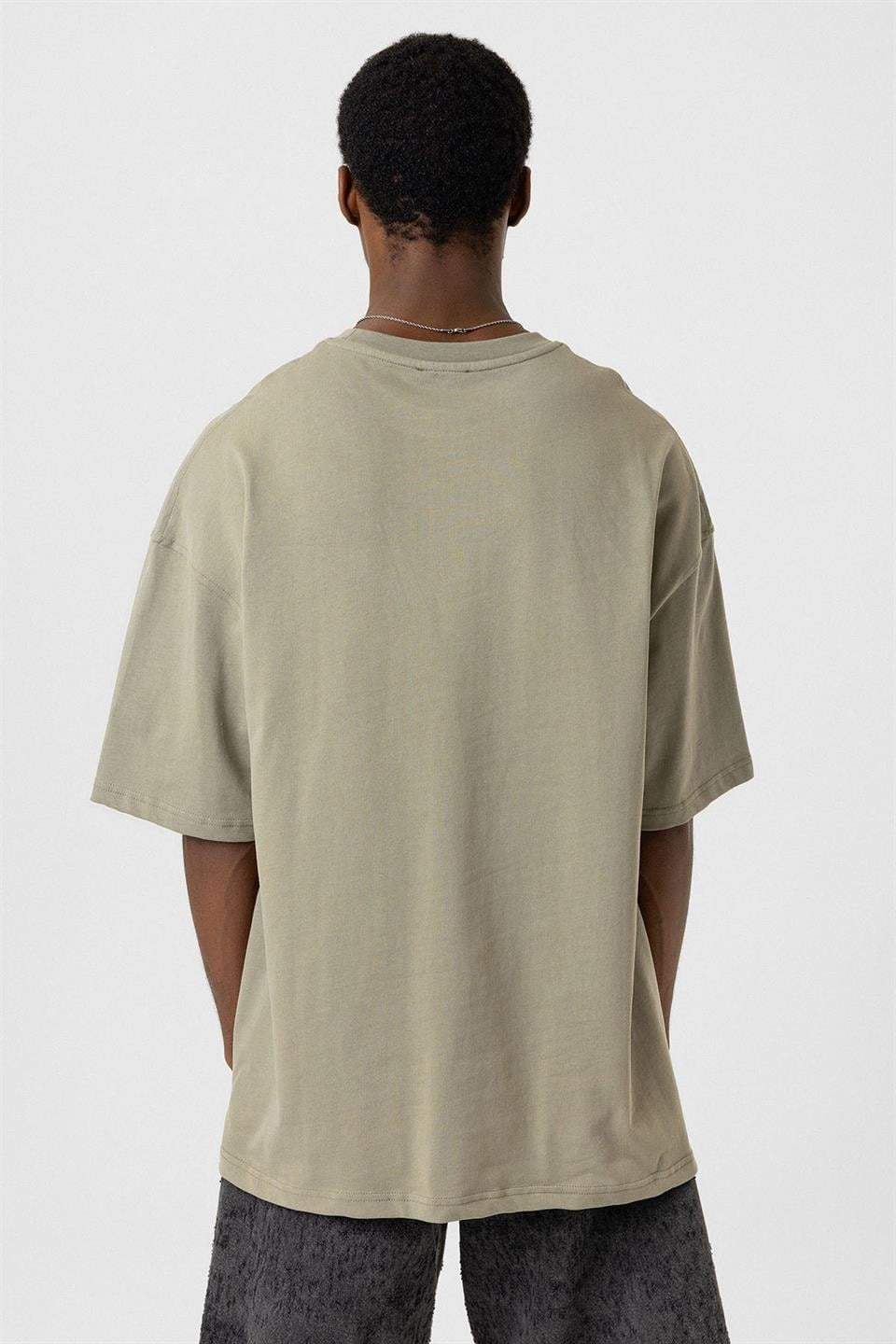 Oversized T-Shirt with Bike-Neck Pocket